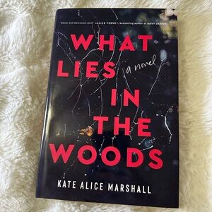 What Lies in the Woods Hardcover Book